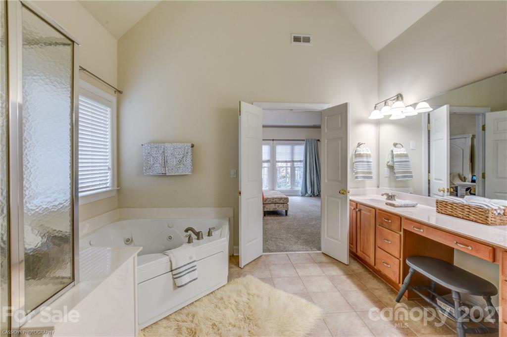 2678 Landing Pointe Drive Clover, SC 29710 - Photo 27 of 48 a large en suite bathroom with a tub sink and mirror