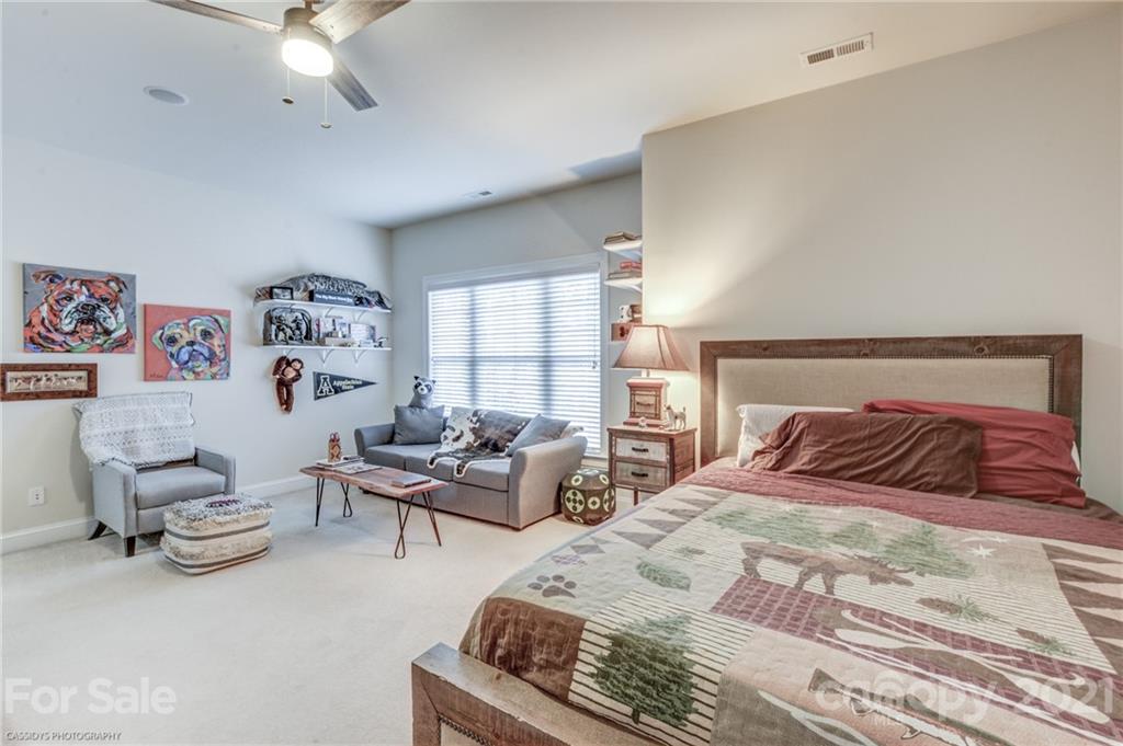 2678 Landing Pointe Drive Clover, SC 29710 - Photo 33 of 48 a bedroom with a bed and furniture