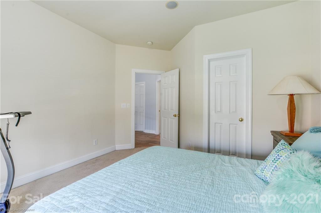 2678 Landing Pointe Drive Clover, SC 29710 - Photo 38 of 48 a bedroom with a bed and a closet