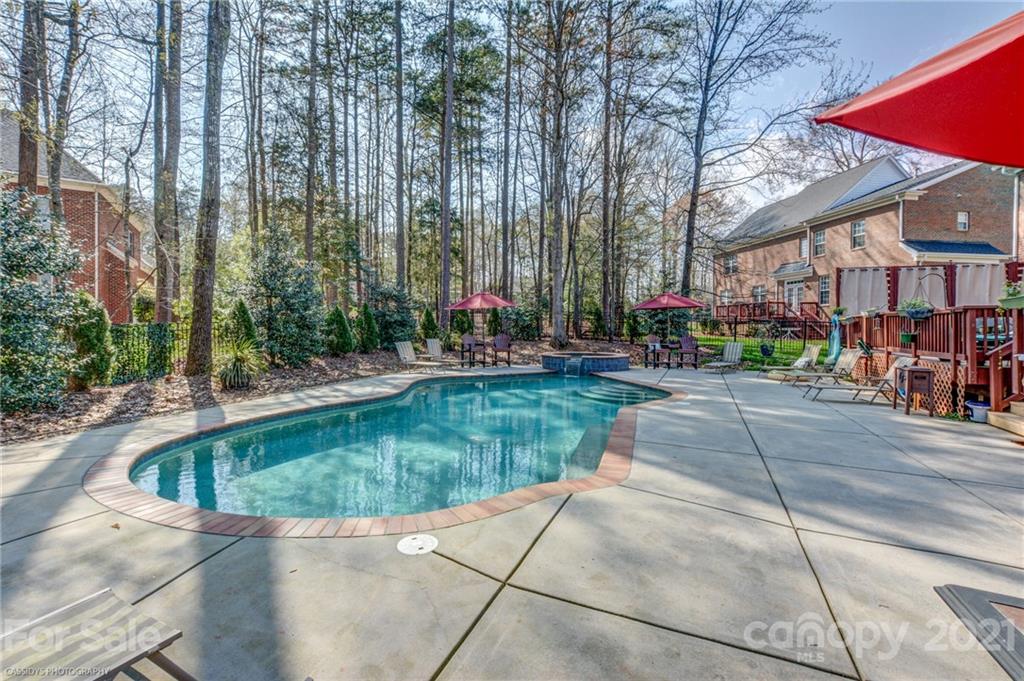 2678 Landing Pointe Drive Clover, SC 29710 - Photo 42 of 48 a swimming pool with outdoor seating and yard
