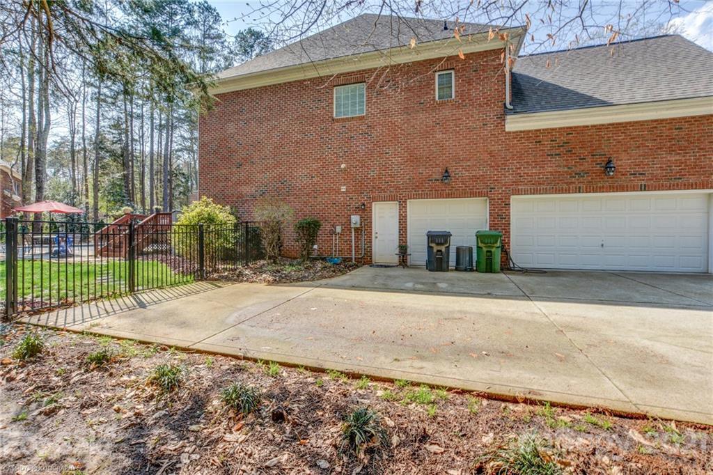 2678 Landing Pointe Drive Clover, SC 29710 - Photo 47 of 48 a front view of a house with a yard and garage