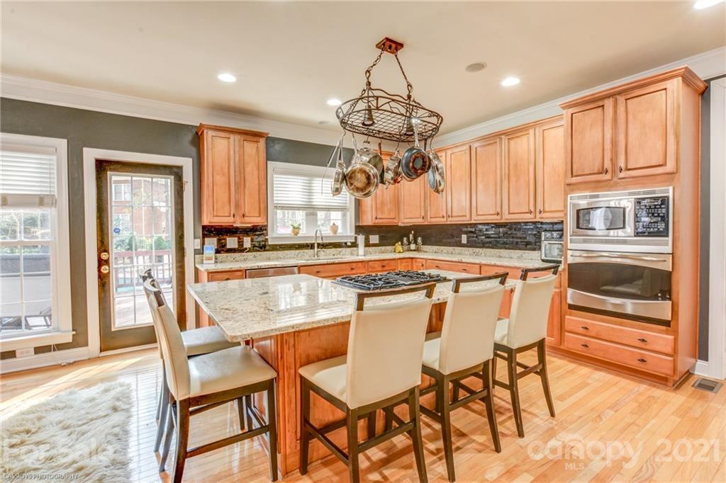 2678 Landing Pointe Drive Clover, SC 29710 - Photo 6 of 48 a view of a dining room with furniture window and wooden floor