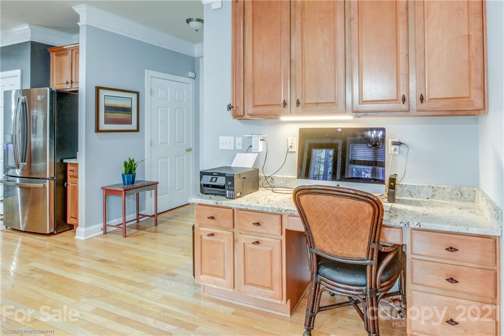 2678 Landing Pointe Drive Clover, SC 29710 - Photo 9 of 48 a kitchen with stainless steel appliances granite countertop a stove a sink refrigerator and cabinets