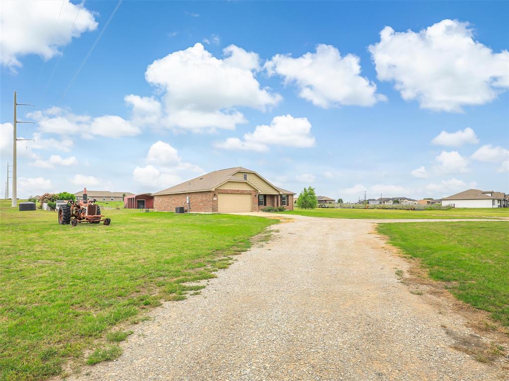 132 County Road 4213 Decatur, TX 76234 - Photo 20 of 27 a view of a lake with a big yard