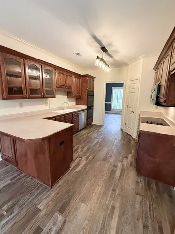 a bathroom with a sink a vanity and a mirror