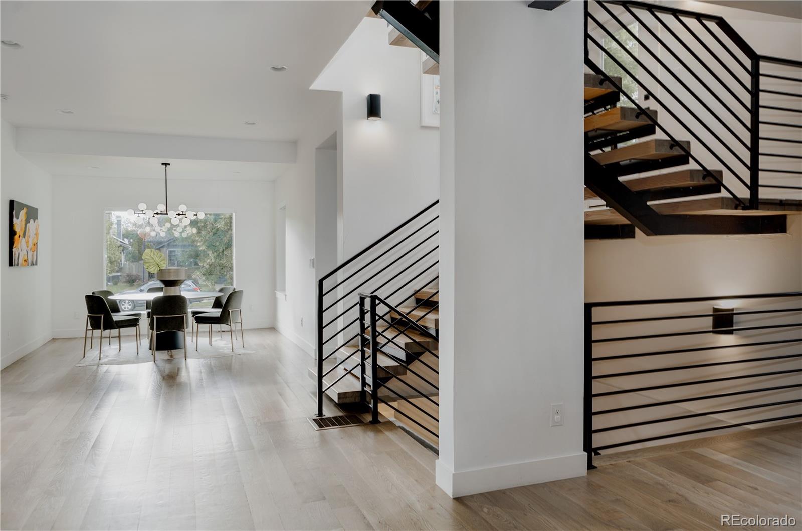 2645 Eudora Street Denver, CO 80207 - Photo 17 of 40 an entryway in a hall with a window