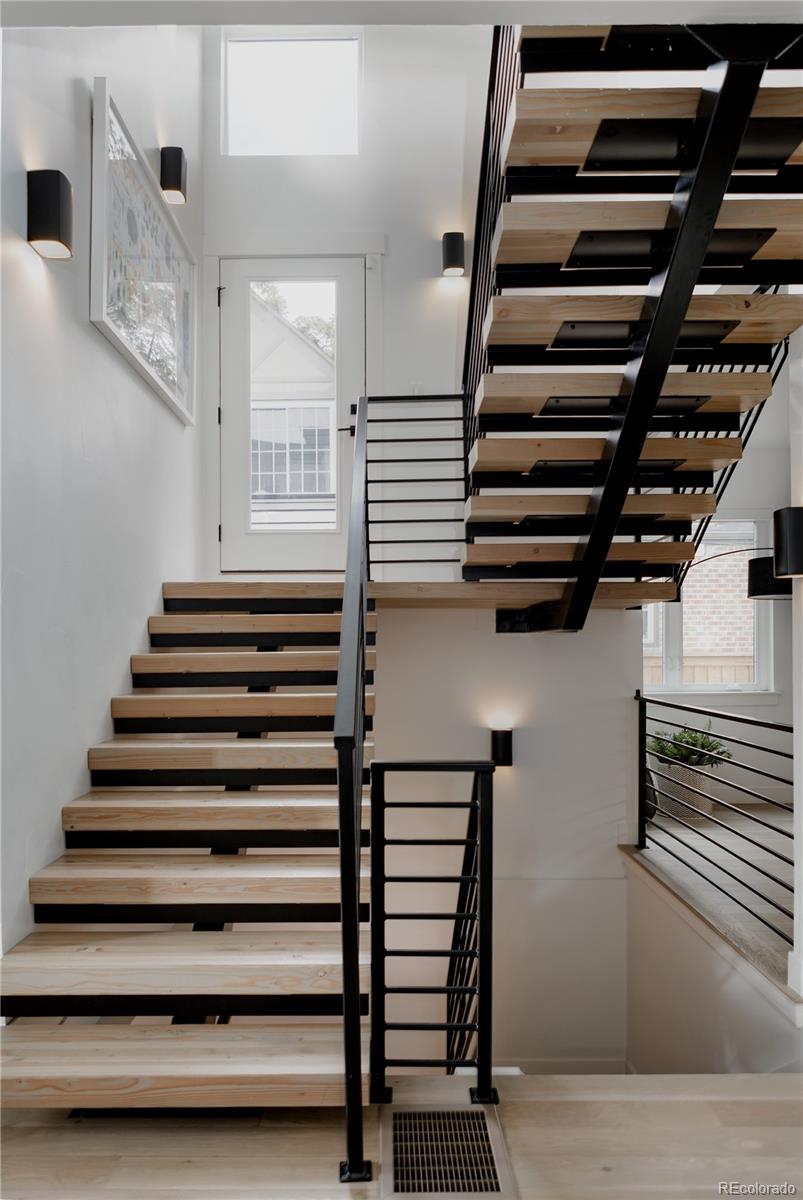 2645 Eudora Street Denver, CO 80207 - Photo 21 of 40 a view of entryway and hall