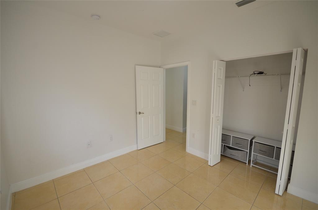 14483 Southwest 13th Terrace Miami, FL 33184 - Photo 15 of 27 a view of an empty room