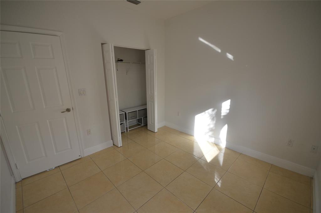 14483 Southwest 13th Terrace Miami, FL 33184 - Photo 16 of 27 a view of a livingroom with a fireplace
