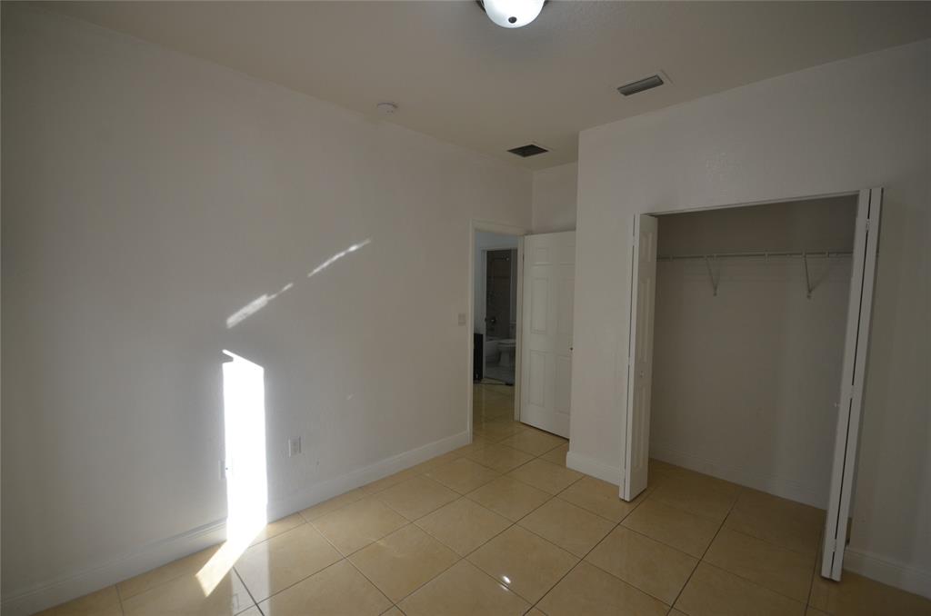 14483 Southwest 13th Terrace Miami, FL 33184 - Photo 18 of 27 a view of an empty room