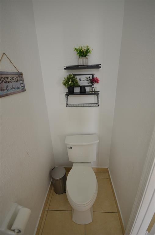 14483 Southwest 13th Terrace Miami, FL 33184 - Photo 22 of 27 a bathroom with a toilet and a sink