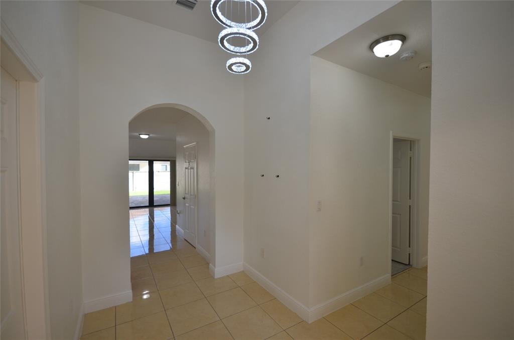14483 Southwest 13th Terrace Miami, FL 33184 - Photo 4 of 27 a view of entryway with front door