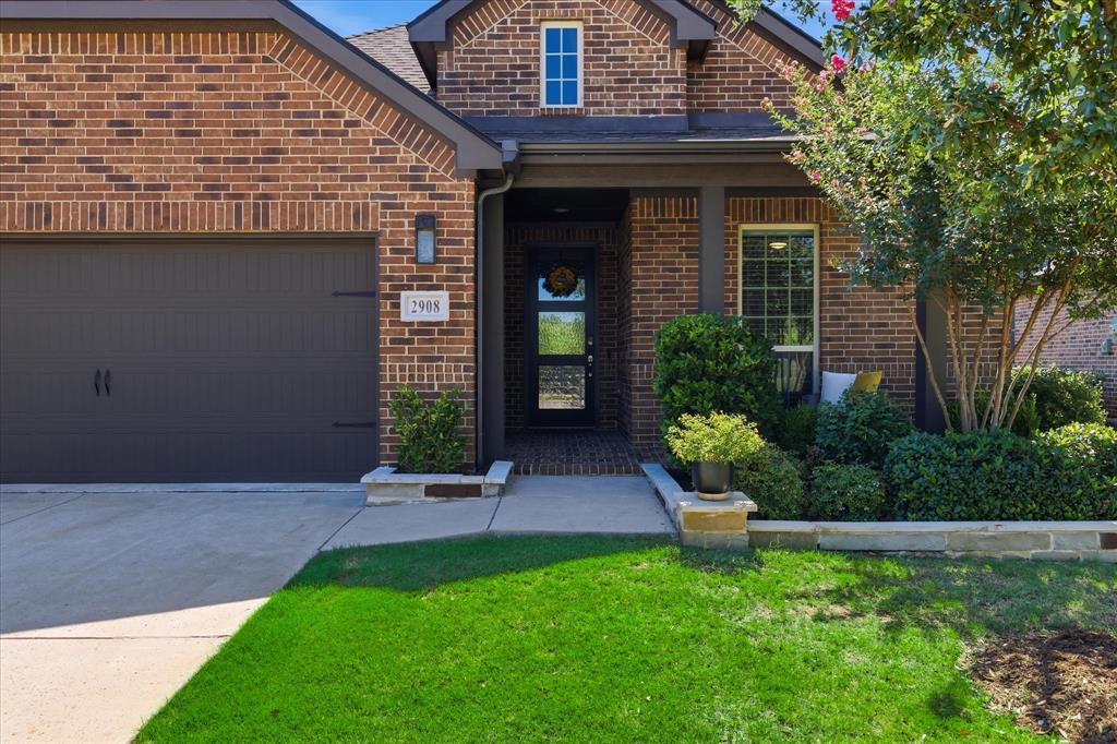 2908 Winding Ridge Court Oak Point, TX 75068 - Photo 5 of 38 Gorgeous landscaped front view of home with patio to enjoy the private cul-de-sac.