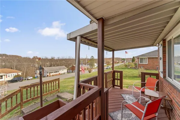 a view of a balcony with lake view and a ocean view