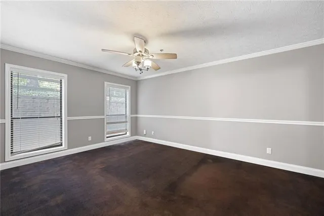 an empty room with windows