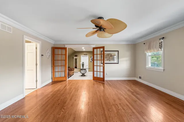 a bathroom with a toilet a sink and a mirror