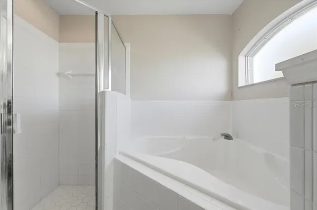 a close view of a bathtub in bathroom