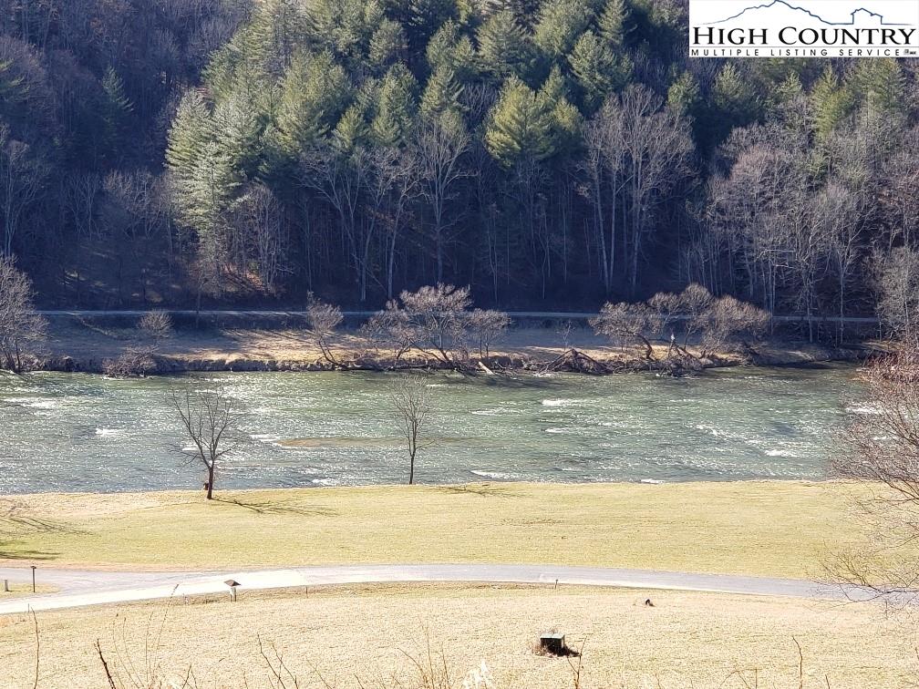 Lot #46 Moxley Ridge Road Sparta, VA 28675 - Photo 4 of 28 a view of swimming pool with an outdoor space and seating area