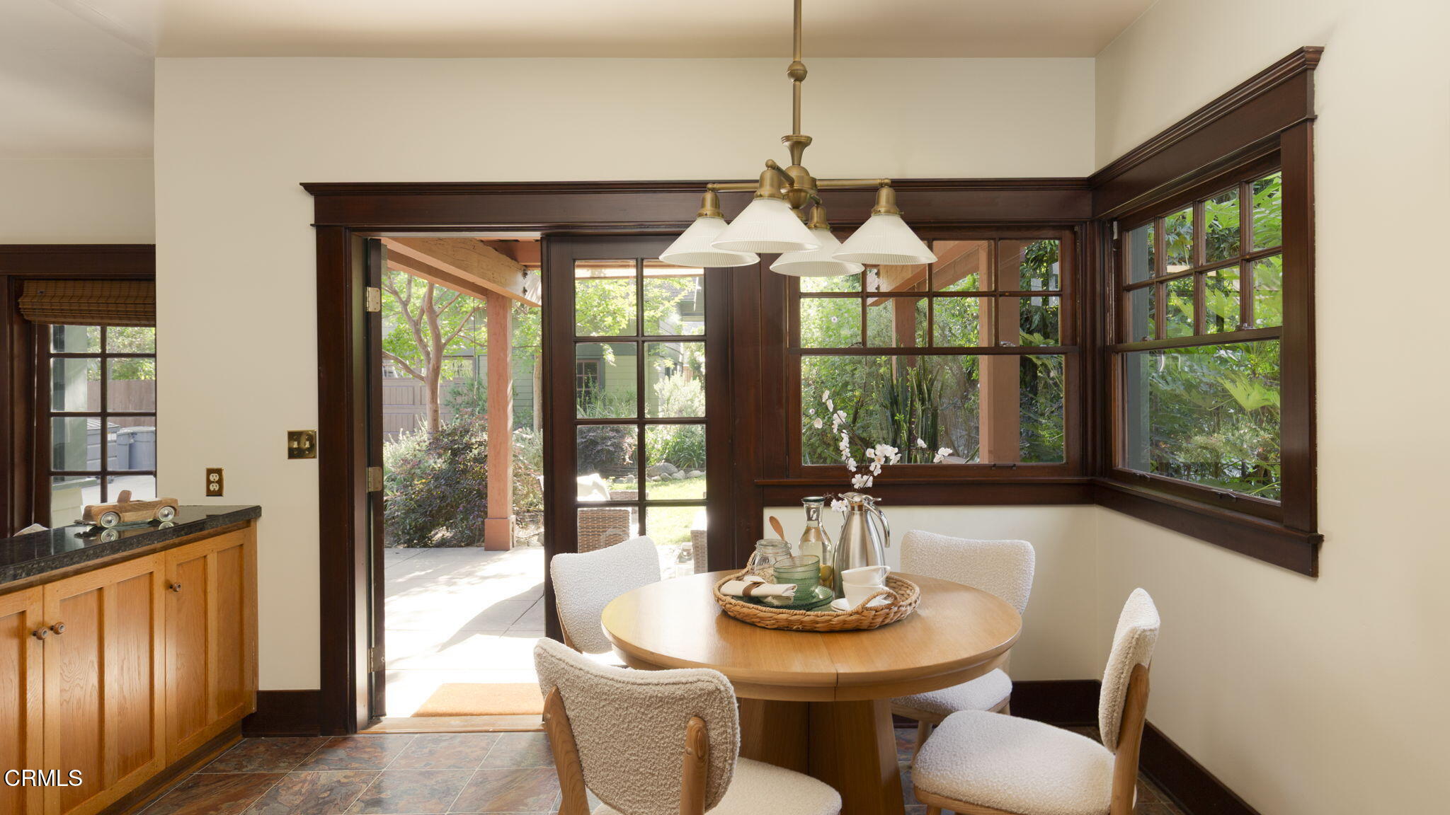 1813 Wayne Avenue South Pasadena, CA 91030 - Photo 25 of 56 a view of a dining room with furniture large windows and wooden floor