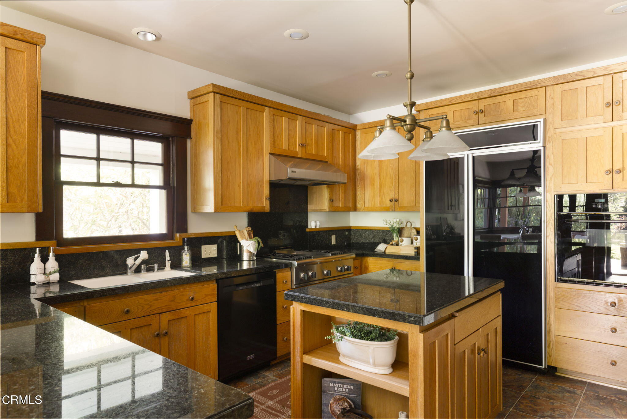 1813 Wayne Avenue South Pasadena, CA 91030 - Photo 28 of 56 a kitchen that has a sink and a stove in it