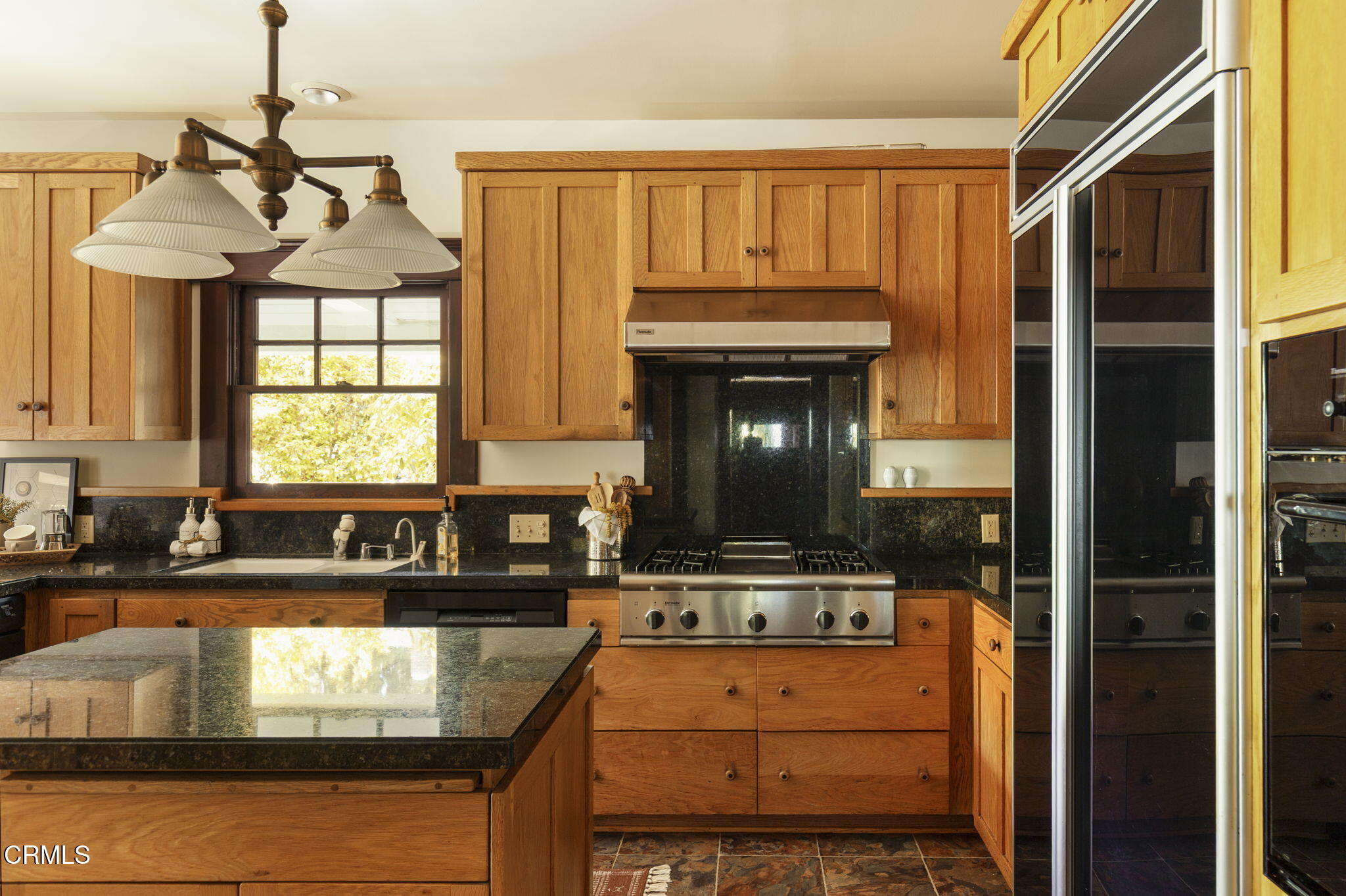 1813 Wayne Avenue South Pasadena, CA 91030 - Photo 29 of 56 a kitchen with kitchen island granite countertop a stove a sink and a granite counter tops