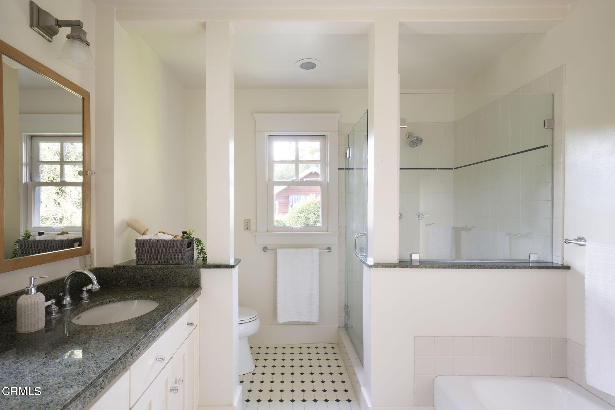1813 Wayne Avenue South Pasadena, CA 91030 - Photo 37 of 56 a bathroom with a granite countertop sink a mirror and a shower