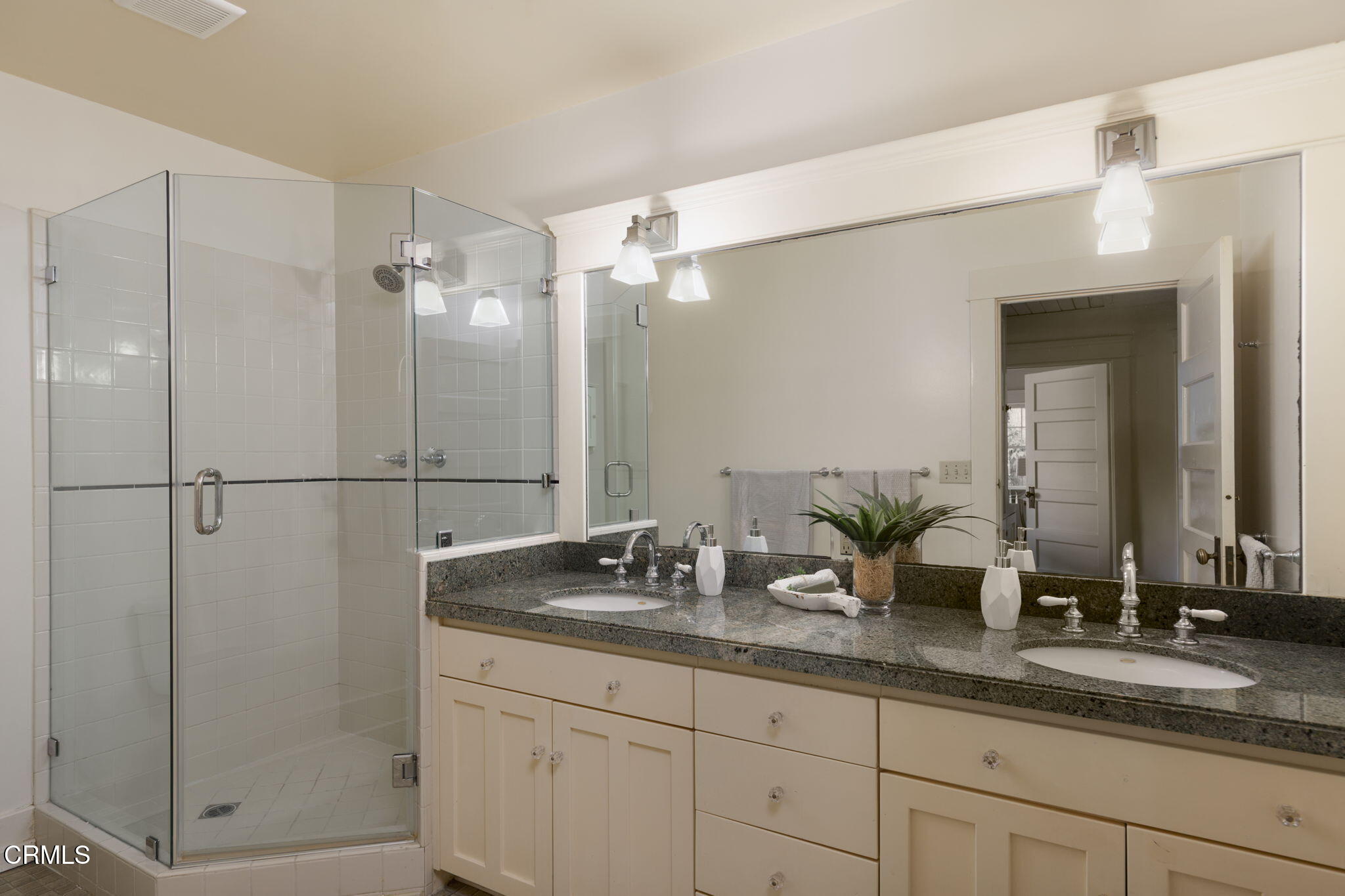 1813 Wayne Avenue South Pasadena, CA 91030 - Photo 43 of 56 a bathroom with double sink and a mirror
