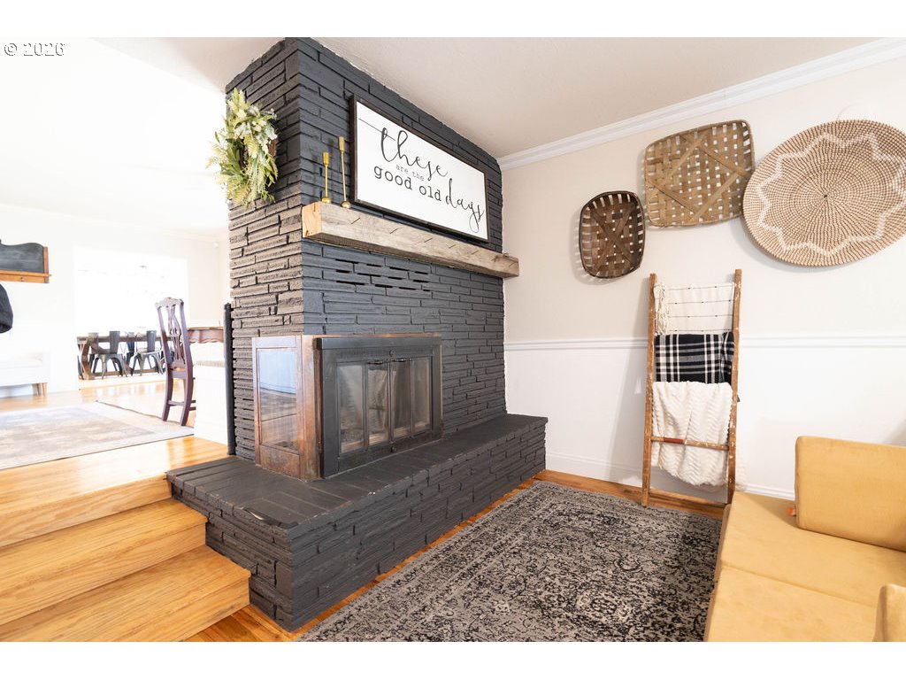 2703 North Spruce Street La Grande, OR 97850 - Photo 13 of 37 a living room with furniture and a fireplace