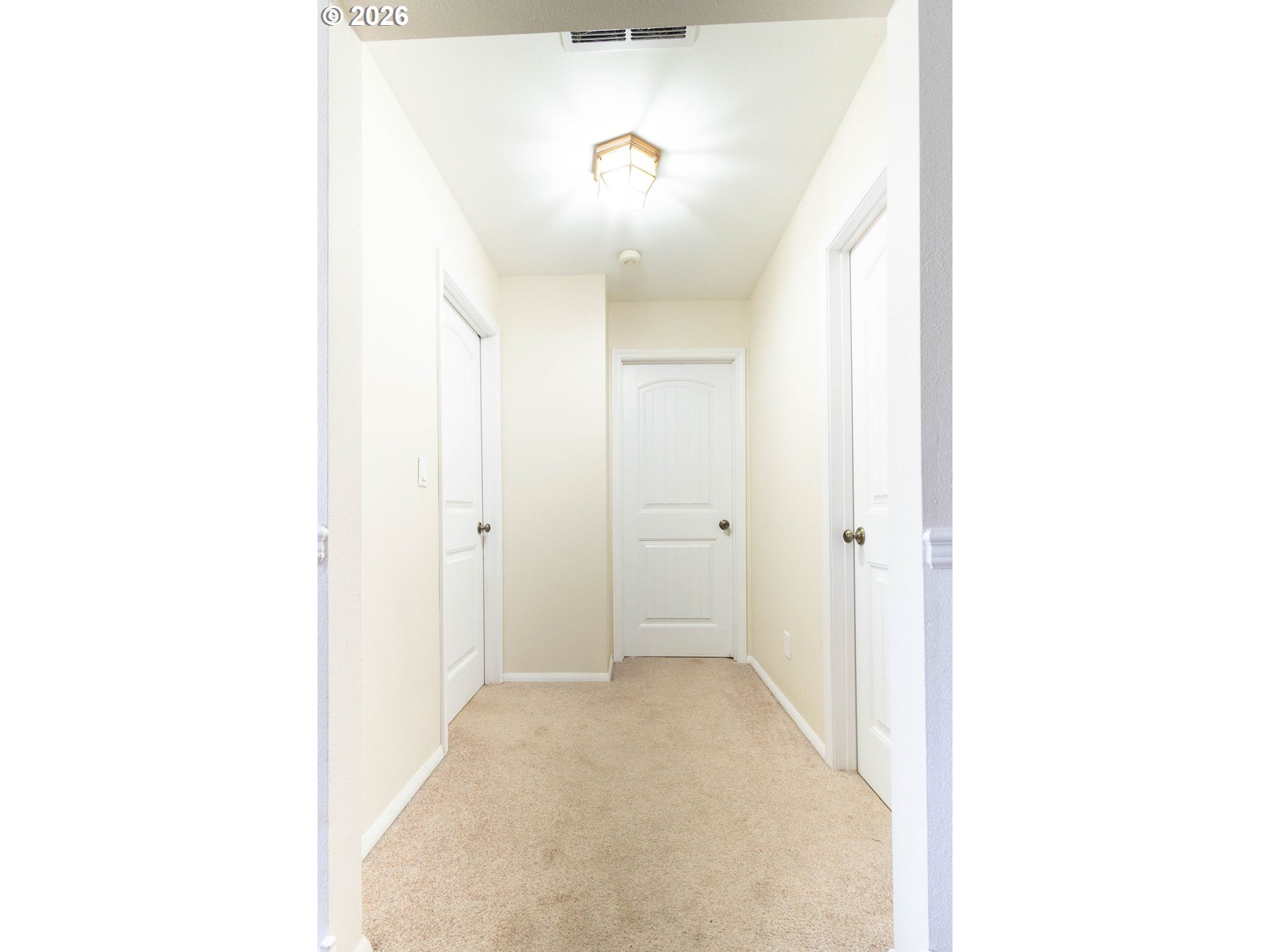 2703 North Spruce Street La Grande, OR 97850 - Photo 16 of 37 a view of a room with a hallway
