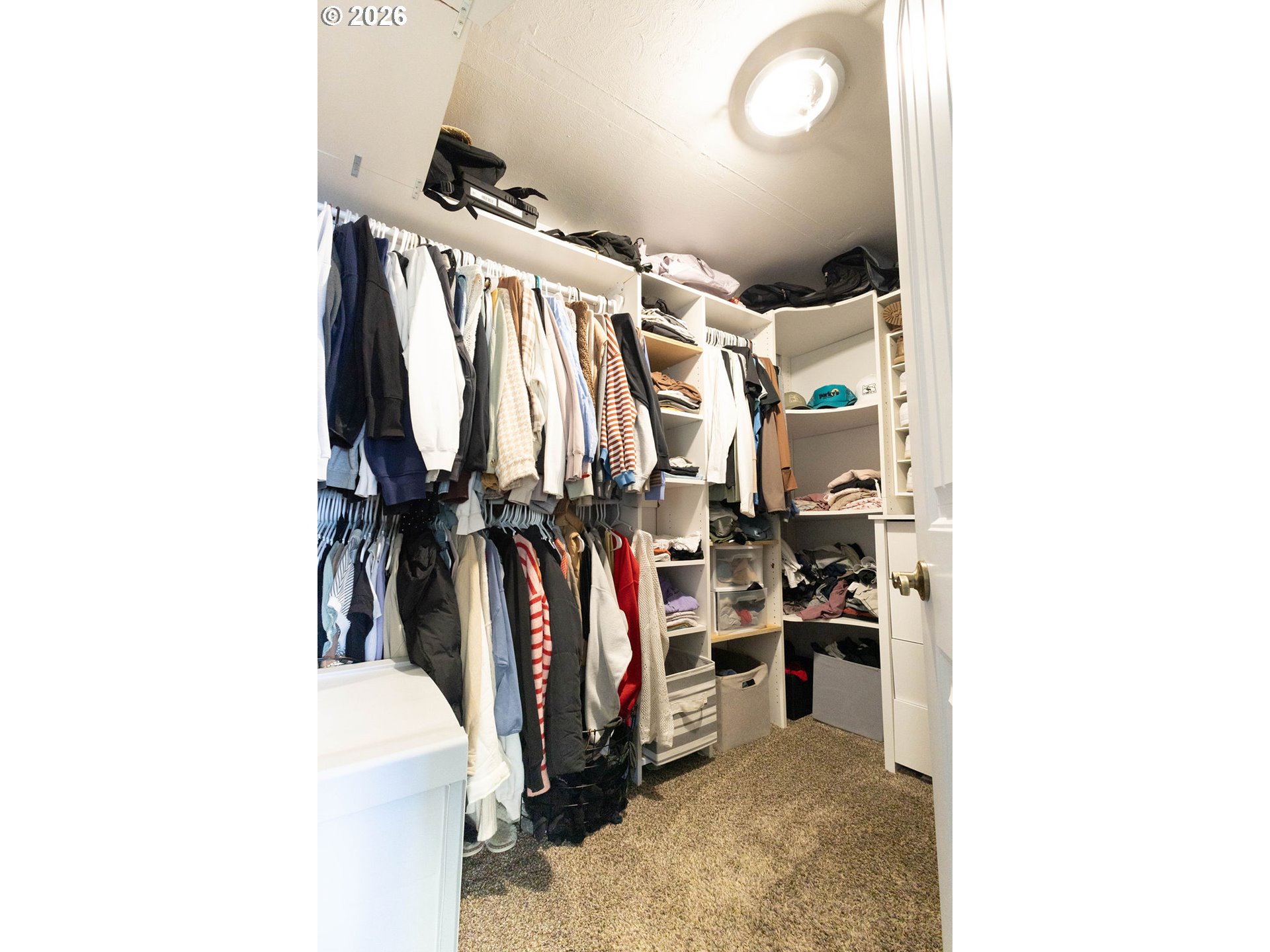 2703 North Spruce Street La Grande, OR 97850 - Photo 22 of 37 a view of walk in closet with clothes and shoes