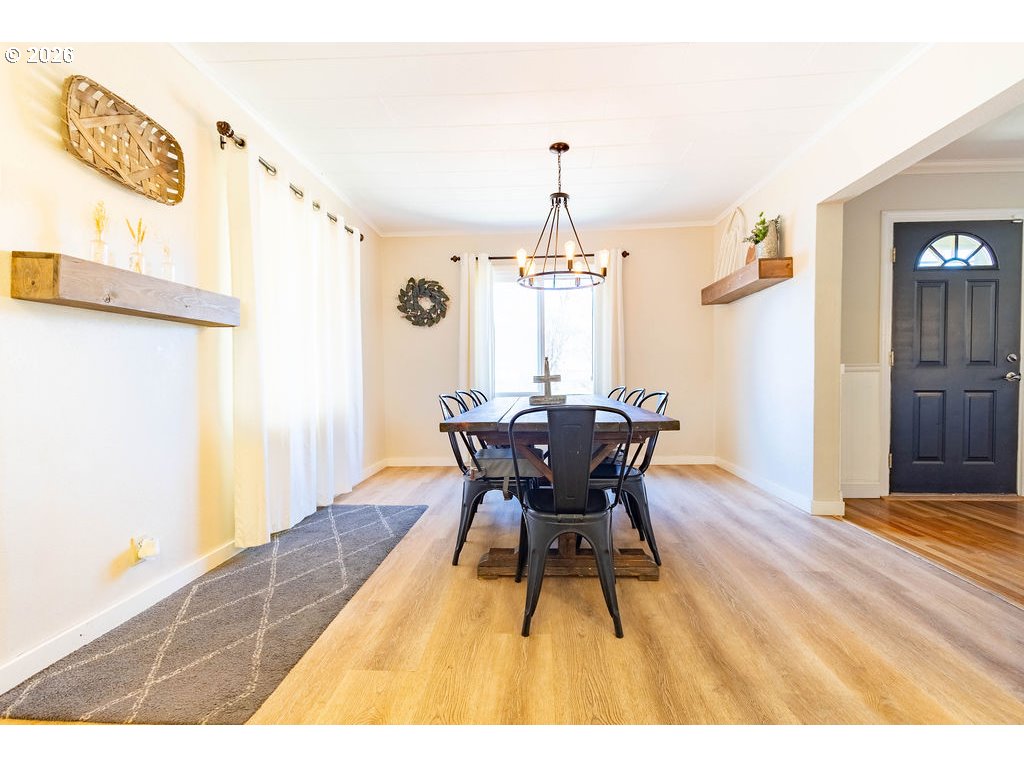 2703 North Spruce Street La Grande, OR 97850 - Photo 6 of 37 a dining room with furniture and chandelier