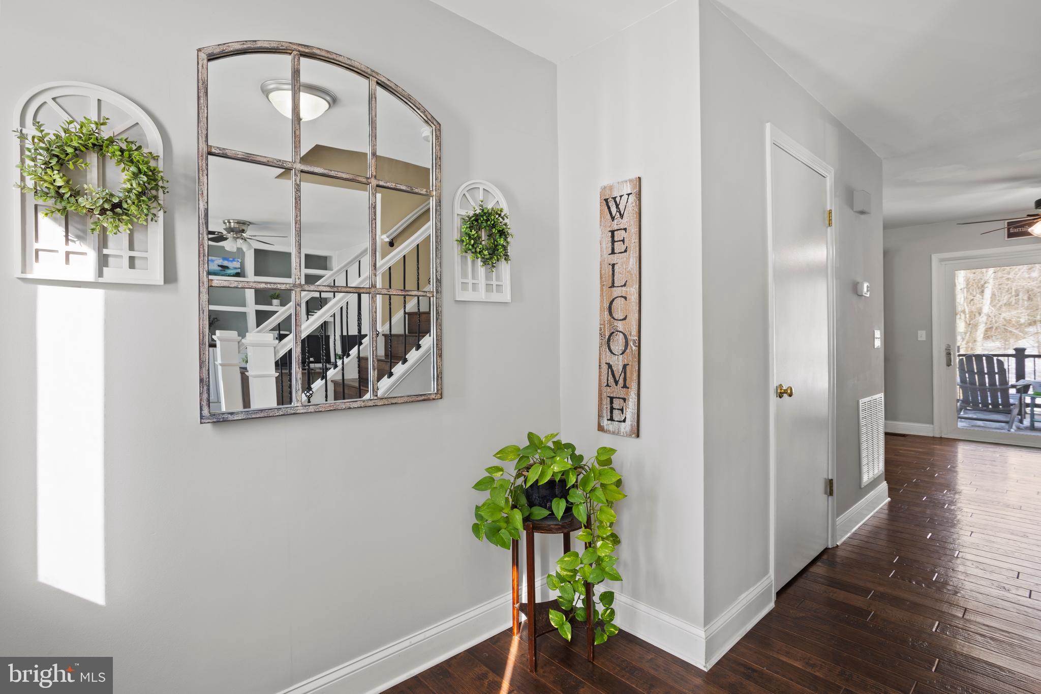 7955 Arbor Way Owings, MD 20736 - Photo 11 of 83 a view of an entryway with wooden floor