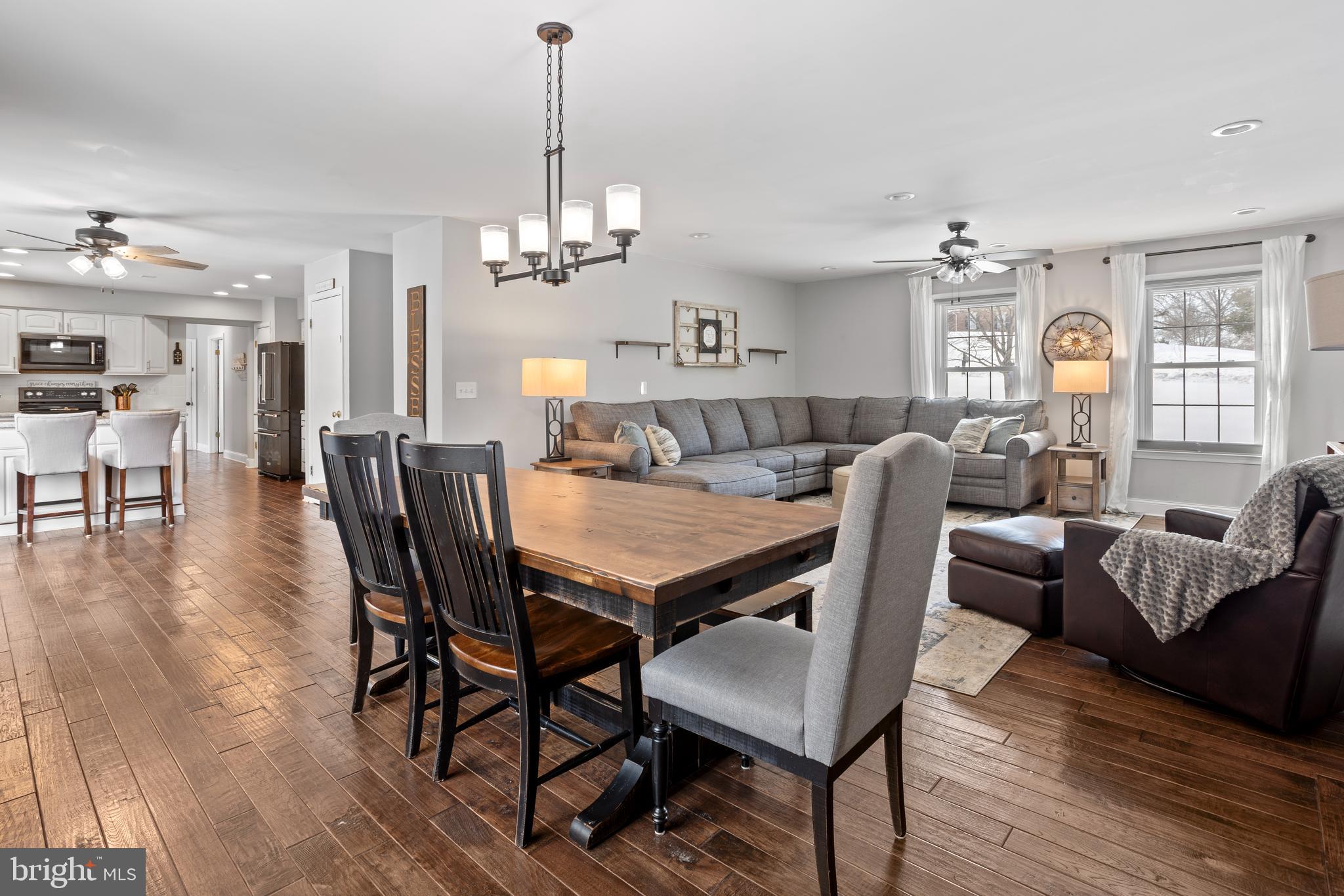 7955 Arbor Way Owings, MD 20736 - Photo 12 of 83 a view of a dining room with furniture window and wooden floor