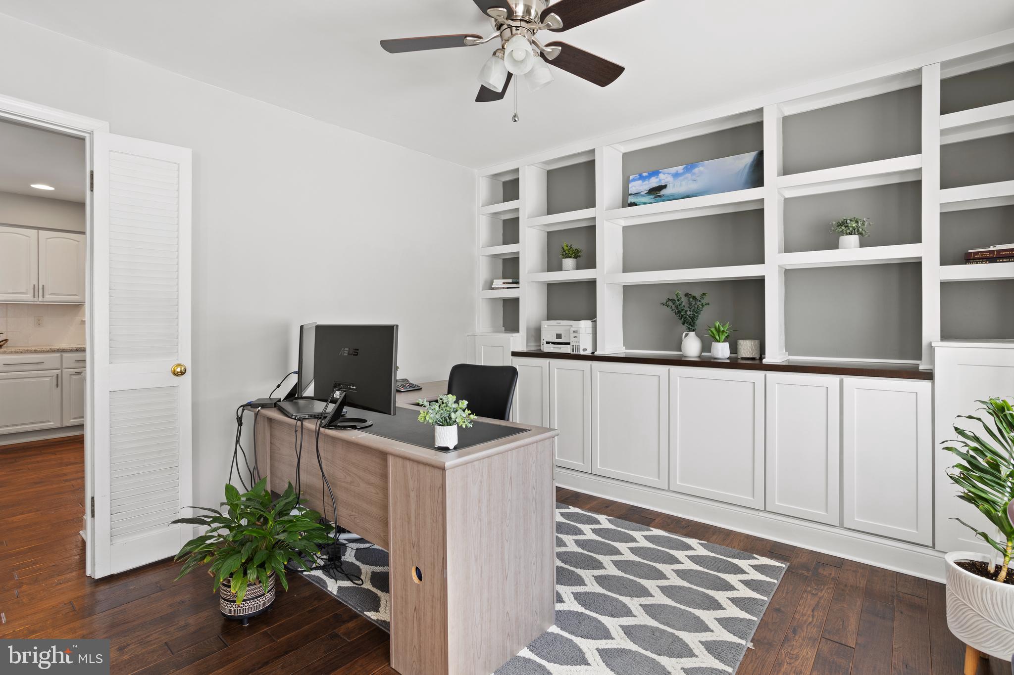 7955 Arbor Way Owings, MD 20736 - Photo 9 of 83 a workspace with furniture and wooden floor