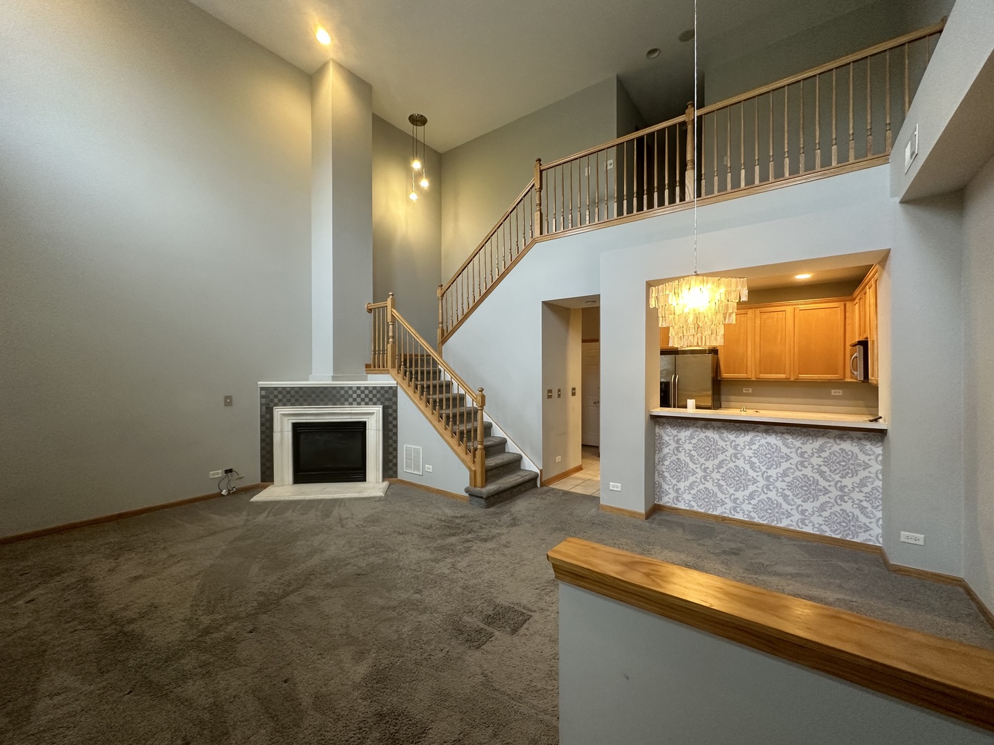 2598 Capitol Avenue Aurora, IL 60503 - Photo 2 of 11 a view of room with stairs and wooden floor