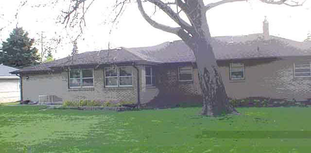1003 North Alpine Road Rockford, IL 61107 - Photo 4 of 4 a view of a house with a garden