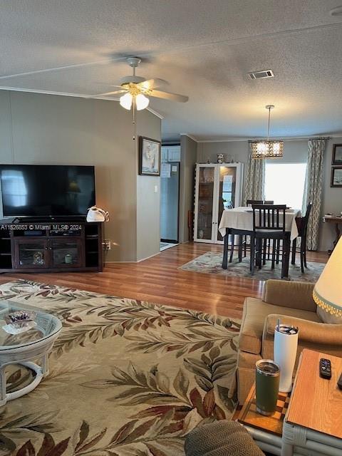 Martin County Stuart, FL 34997 - Photo 16 of 20 a living room with furniture and a flat screen tv