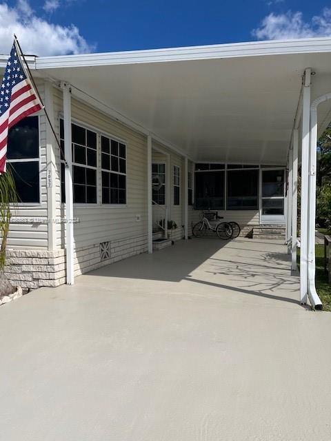 Martin County Stuart, FL 34997 - Photo 20 of 20 a view of the house with garage