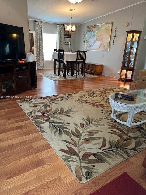 Martin County Stuart, FL 34997 - Photo 6 of 20 a living room with furniture and a flat screen tv