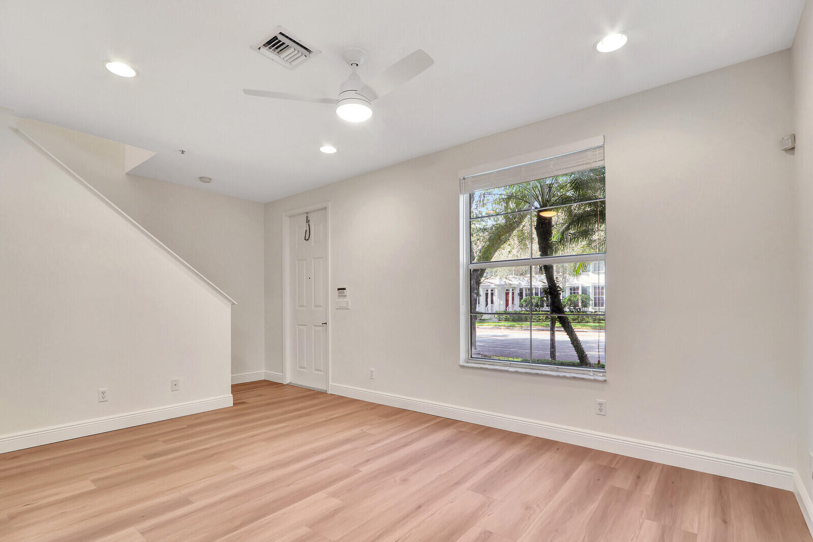 4313 Parkside Drive Jupiter, FL 33458 - Photo 9 of 29 Family Room & Front Door