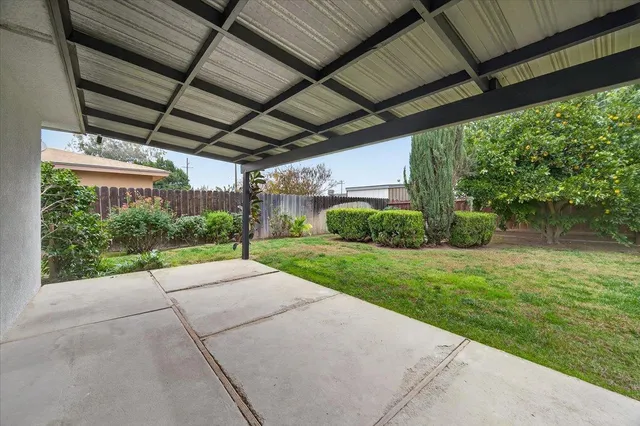 a view of a backyard with porch