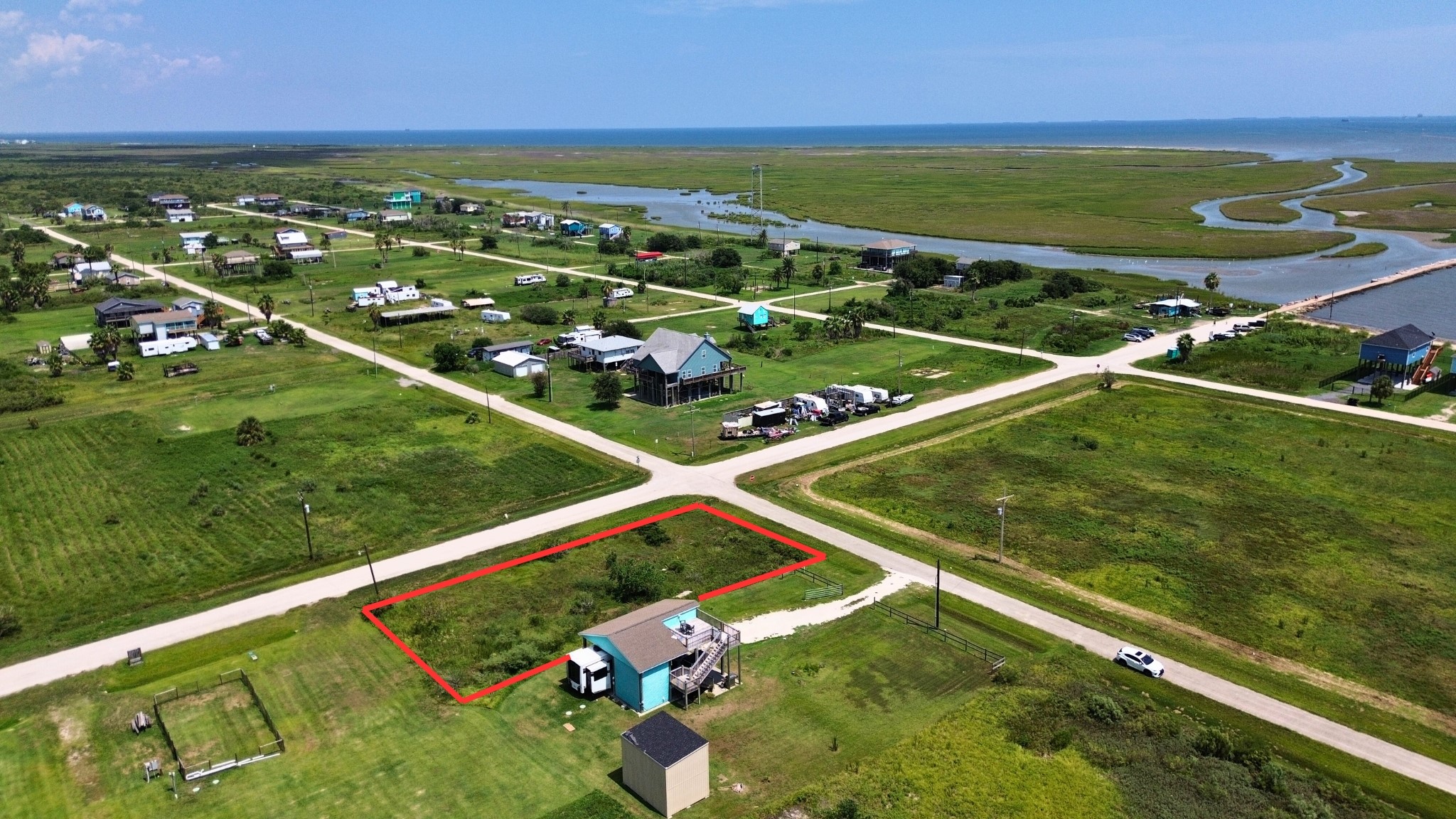 1611 Front Avenue Port Bolivar, TX 77650 - Photo 2 of 10 a view of an outdoor space and a lake view