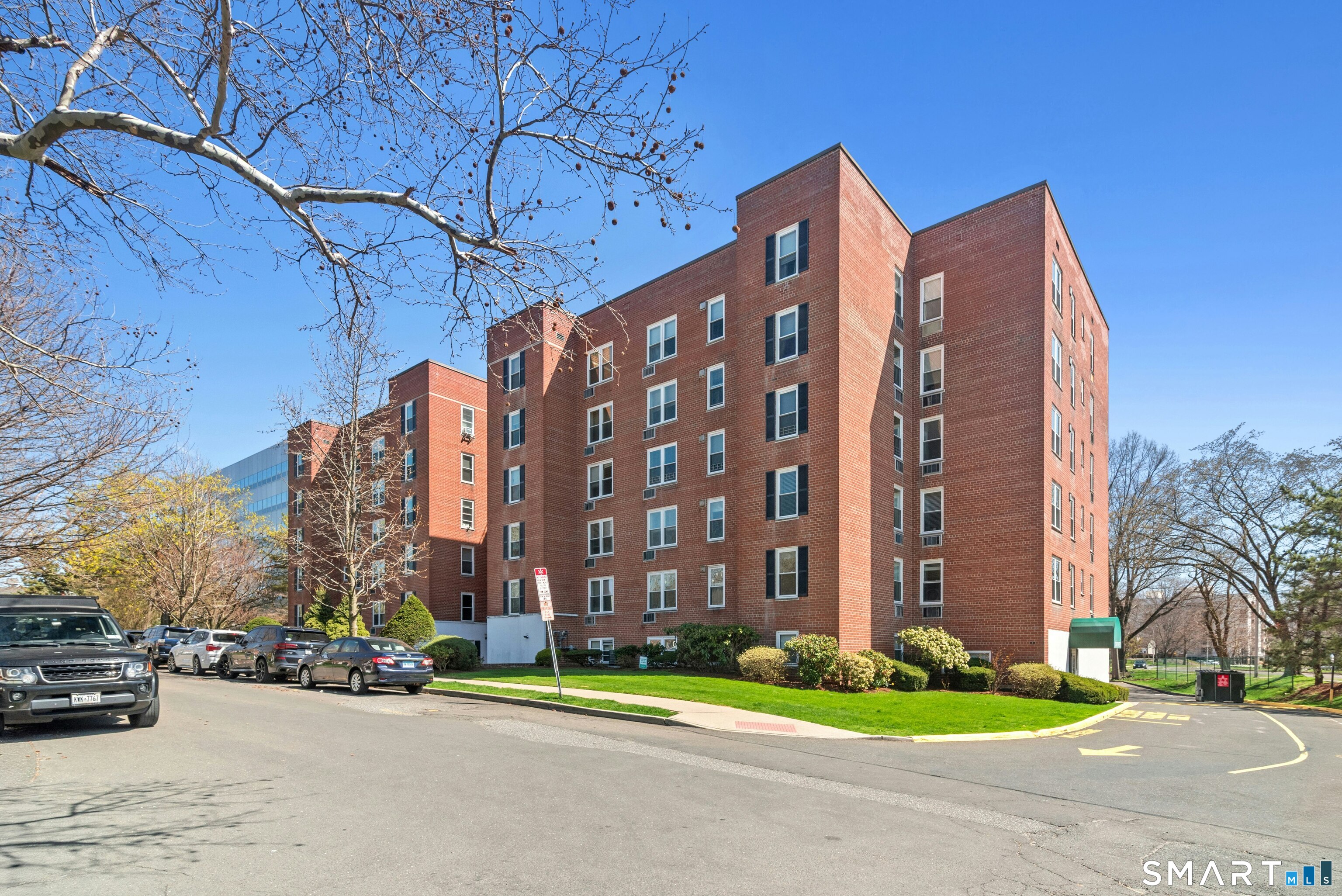7 4th Street, Unit 3C Stamford, CT 06905 - Photo 1 of 21 a view of a tall building next to a road