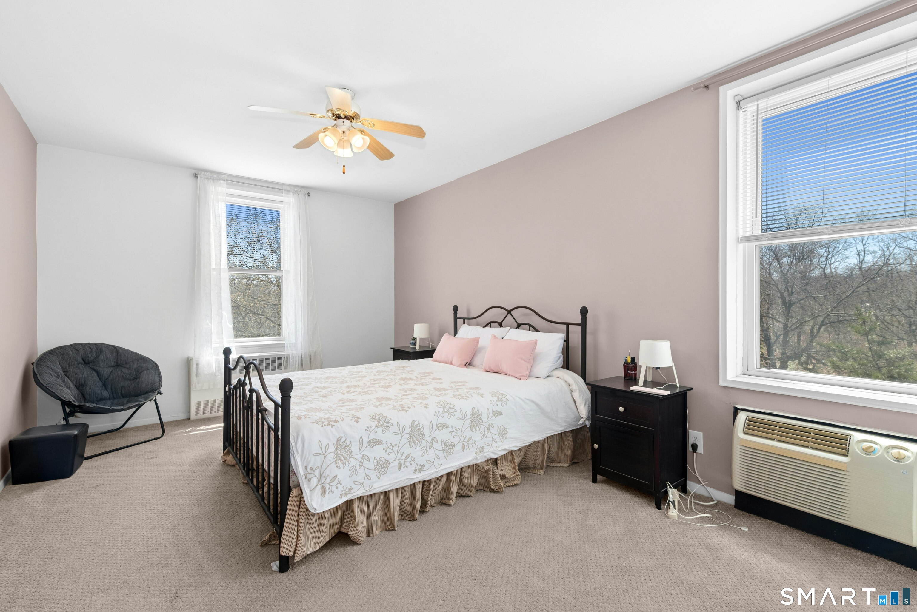 7 4th Street, Unit 3C Stamford, CT 06905 - Photo 16 of 21 a bedroom with a bed and a window