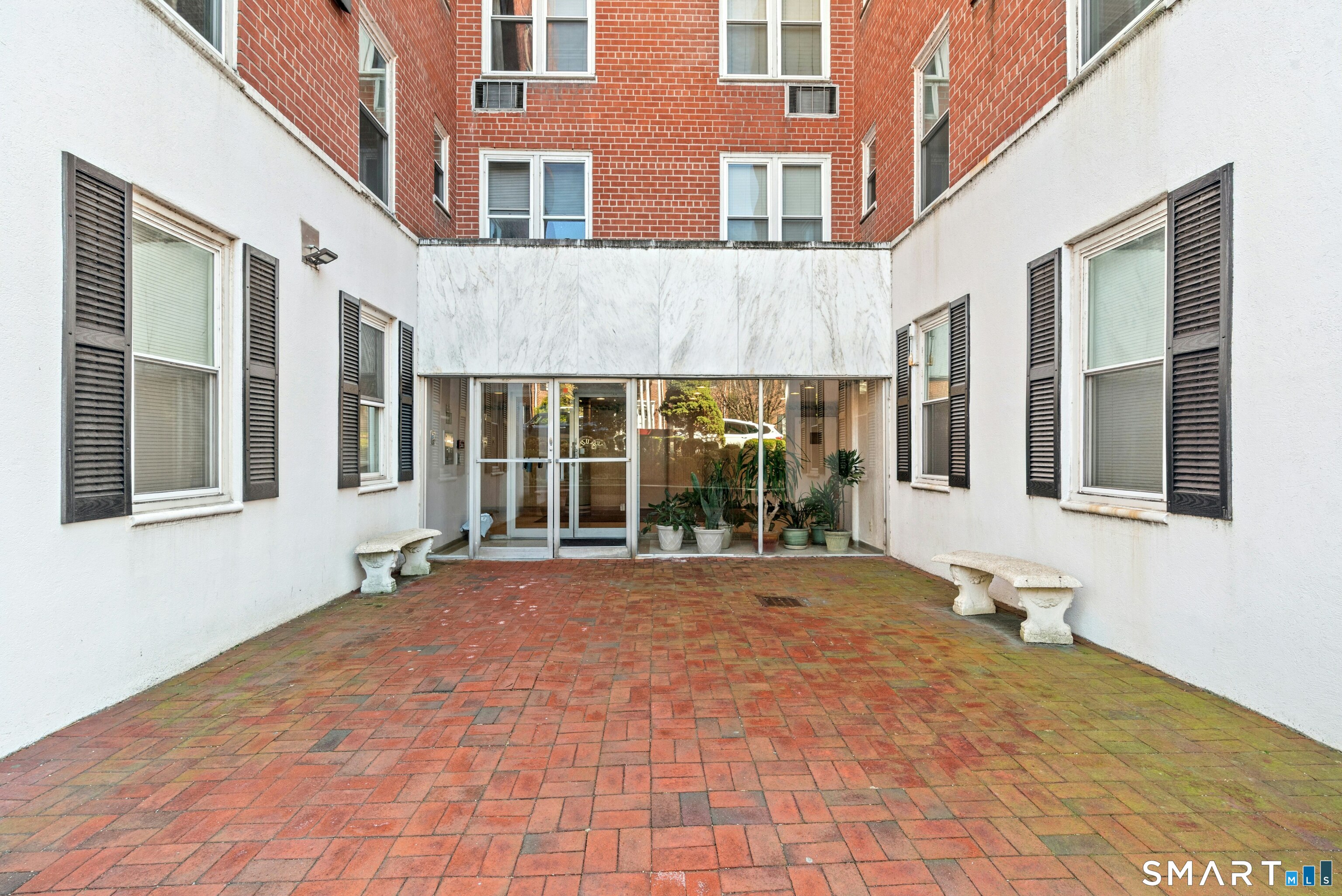 7 4th Street, Unit 3C Stamford, CT 06905 - Photo 3 of 21 a view of house with a outdoor space