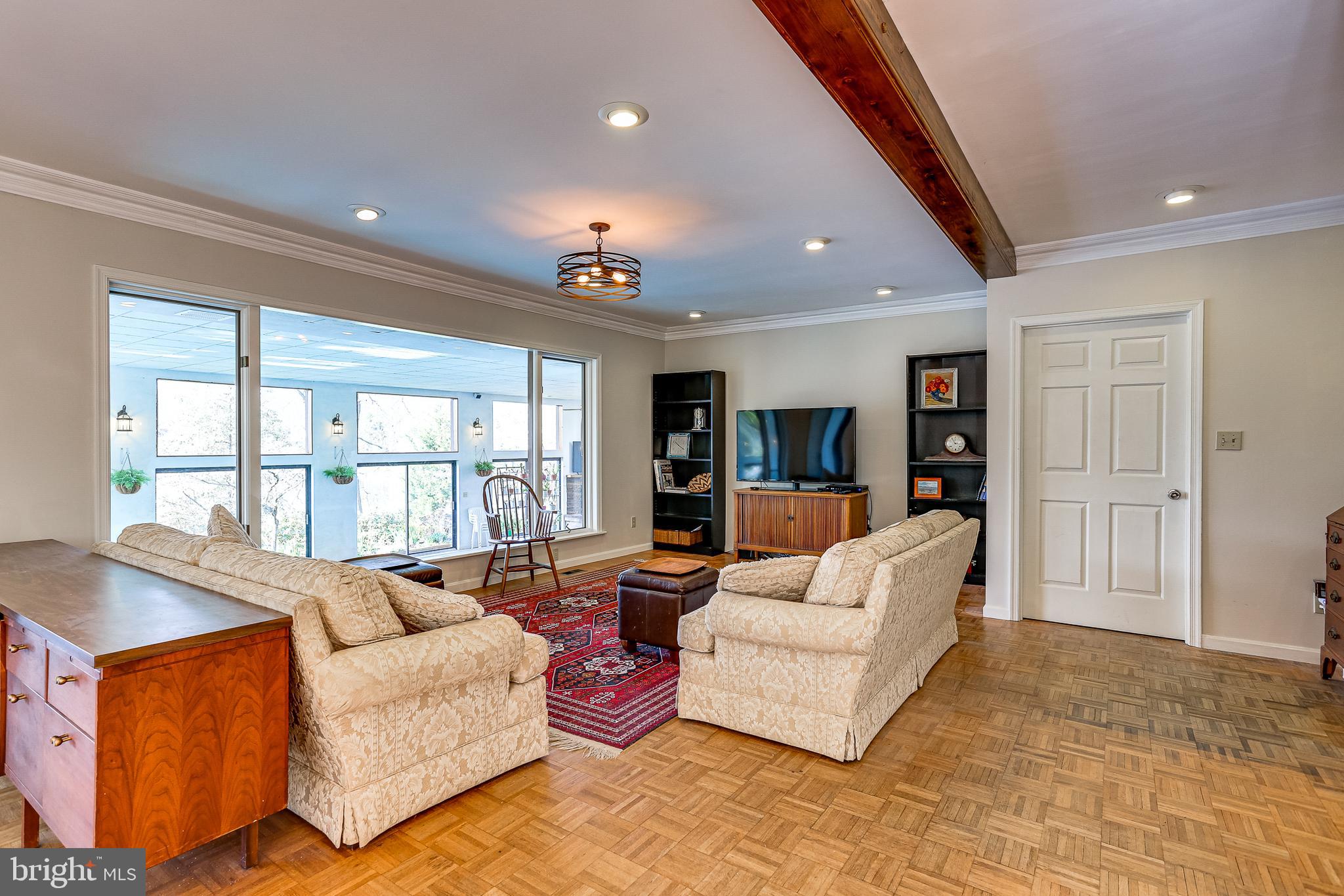 635 Shore Road Severna Park, MD 21146 - Photo 9 of 43 Living Room with view of pool and waterfront