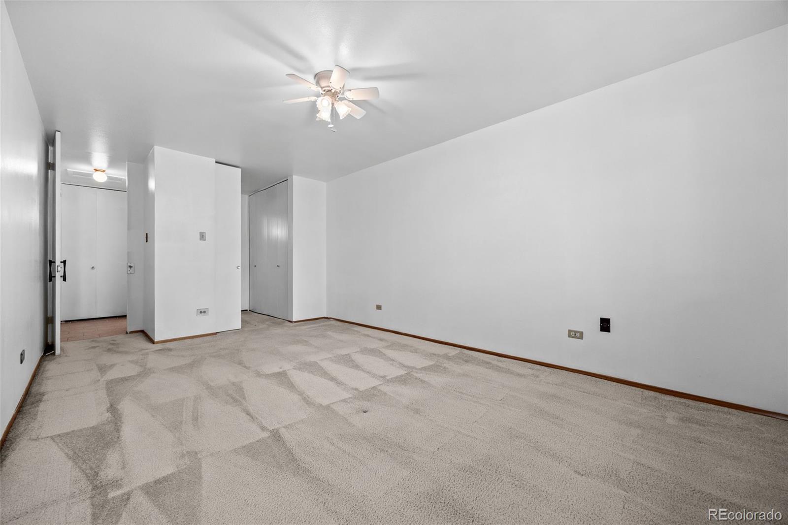 755 South Clinton Street, Unit 7B Denver, CO 80247 - Photo 19 of 36 a view of an empty room