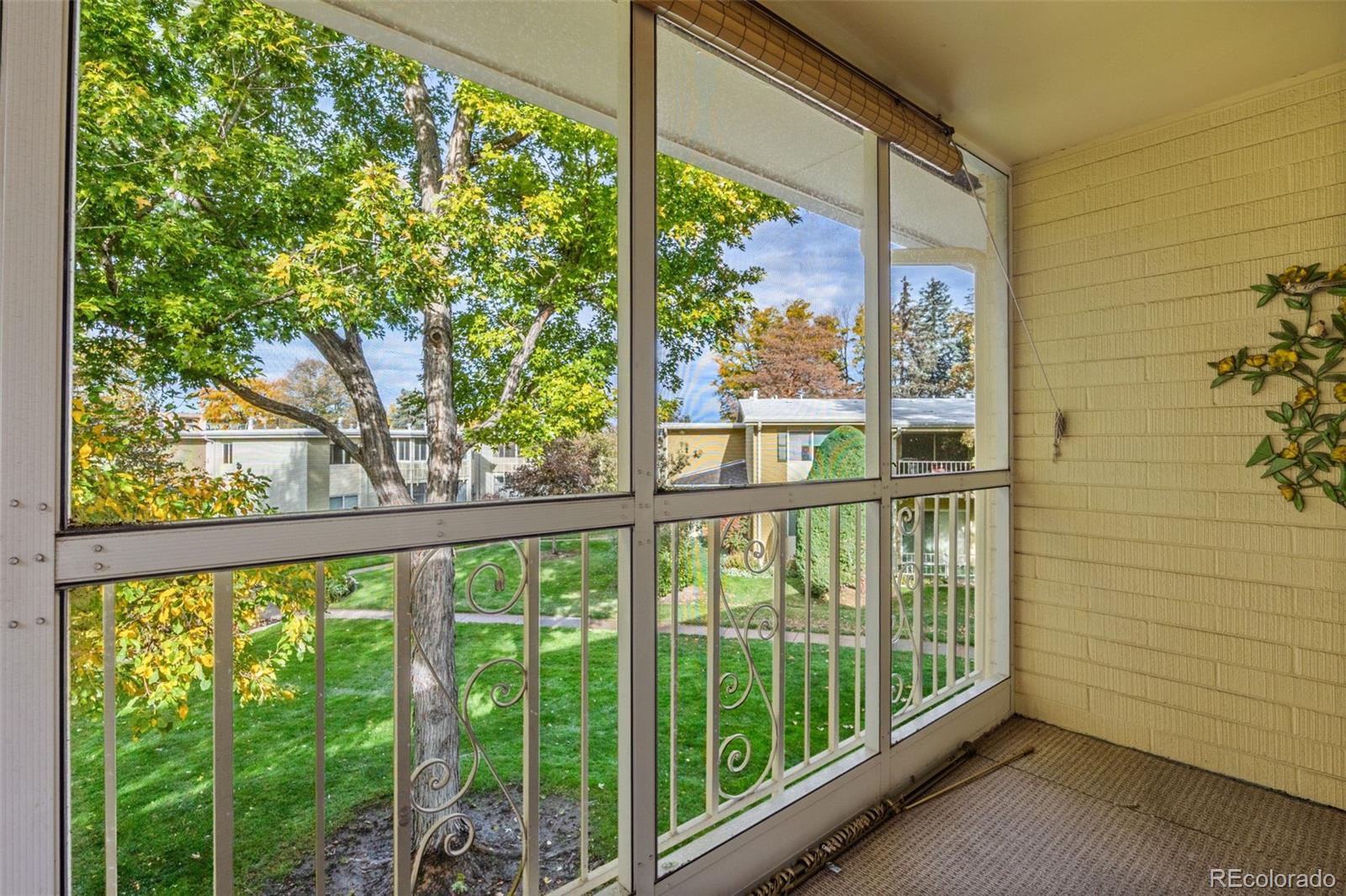 755 South Clinton Street, Unit 7B Denver, CO 80247 - Photo 25 of 36 a view of a porch with a large window