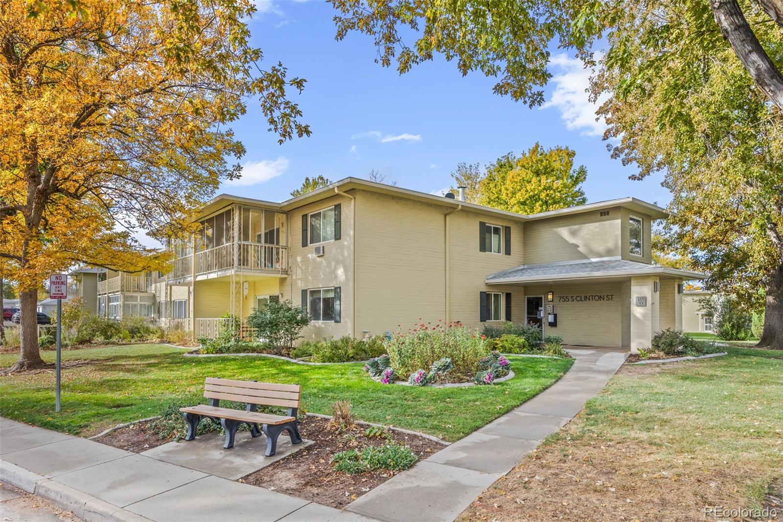 755 South Clinton Street, Unit 7B Denver, CO 80247 - Photo 3 of 36 a view of a house with a yard