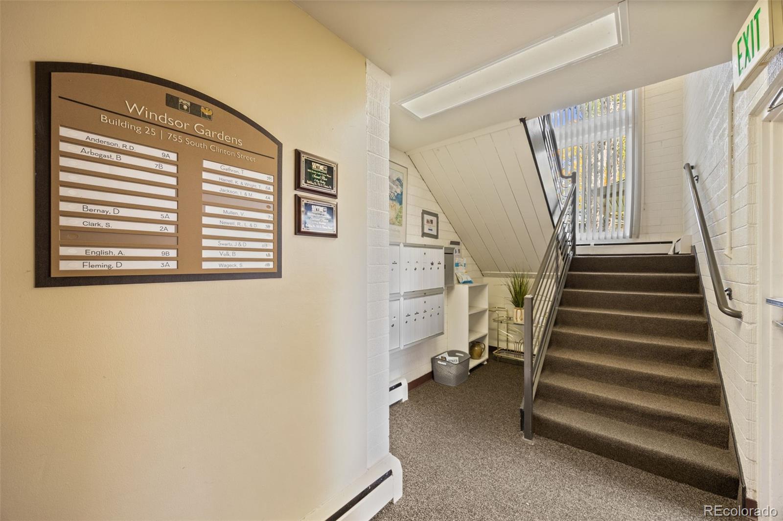 755 South Clinton Street, Unit 7B Denver, CO 80247 - Photo 6 of 36 a view of entryway with wooden floor and windows